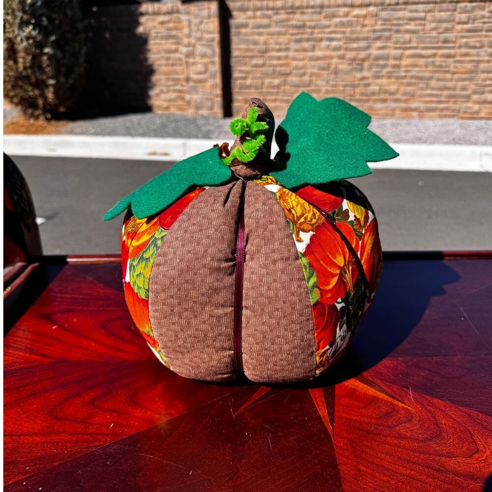 Vintage handmade fabric pumpkin decoration autumn-themed green leaves brown stem